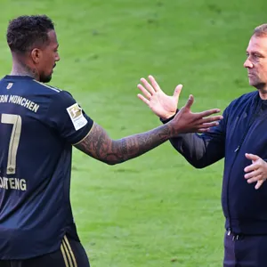 Jerome Boateng (l.) und Hansi Flick
