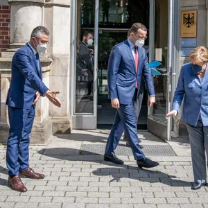Wieler, Spahn. Merkel