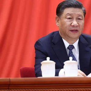 Xi