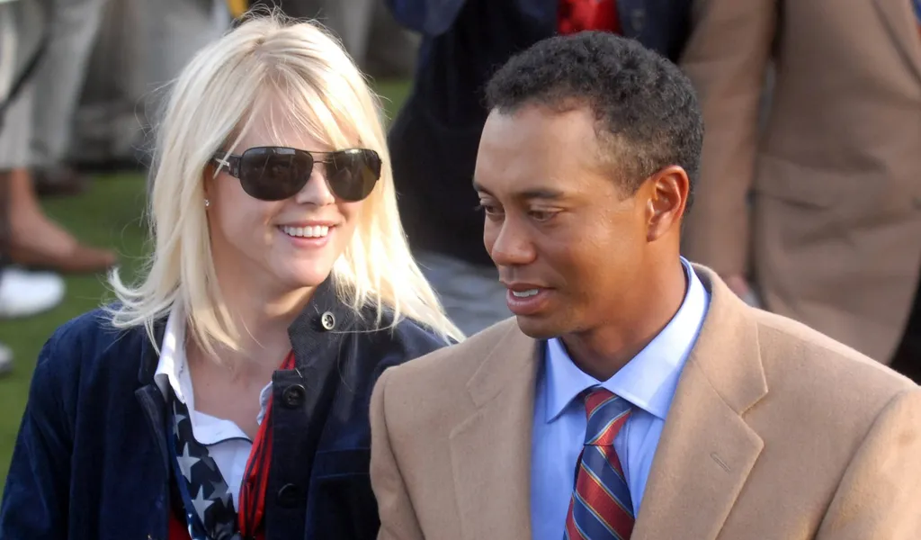 Elin Nordegren (l.) und Tiger Woods