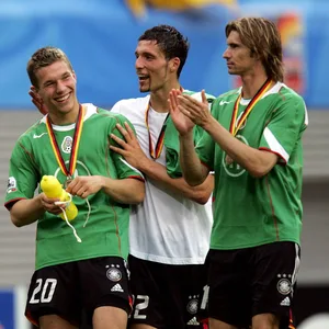 Thomas Brdaric (r.)