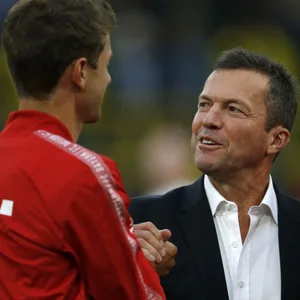 Tomas Müller und Lothar Matthäus