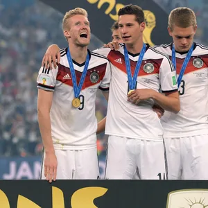 André Schürrle, Julian Draxler und Matthias Ginter feiern den WM-Titel 2014