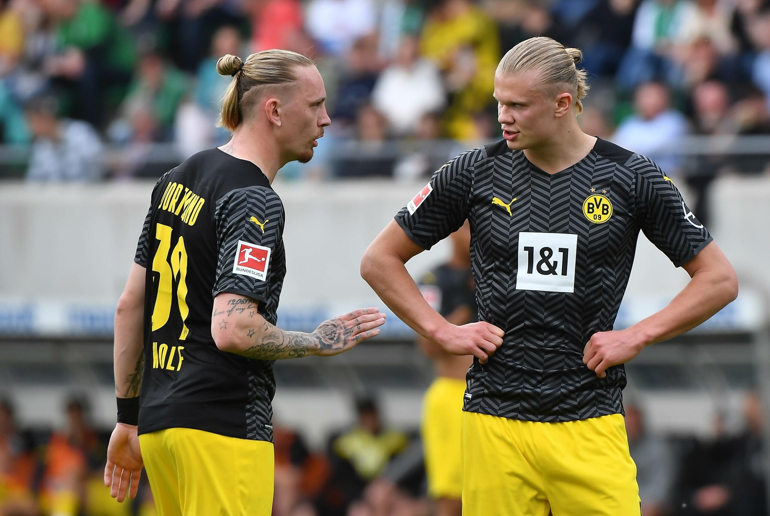 Marius Wolf und Erling Haaland