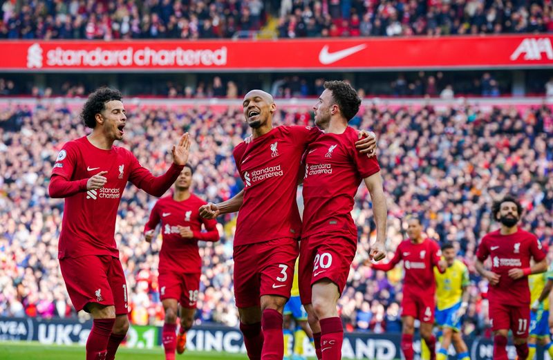 Liverpool players cheer