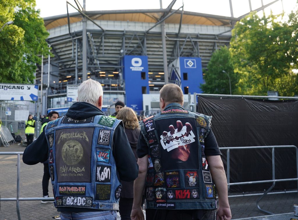 Buddies in frocks: Two Metallica fans on their way to the stadium.
