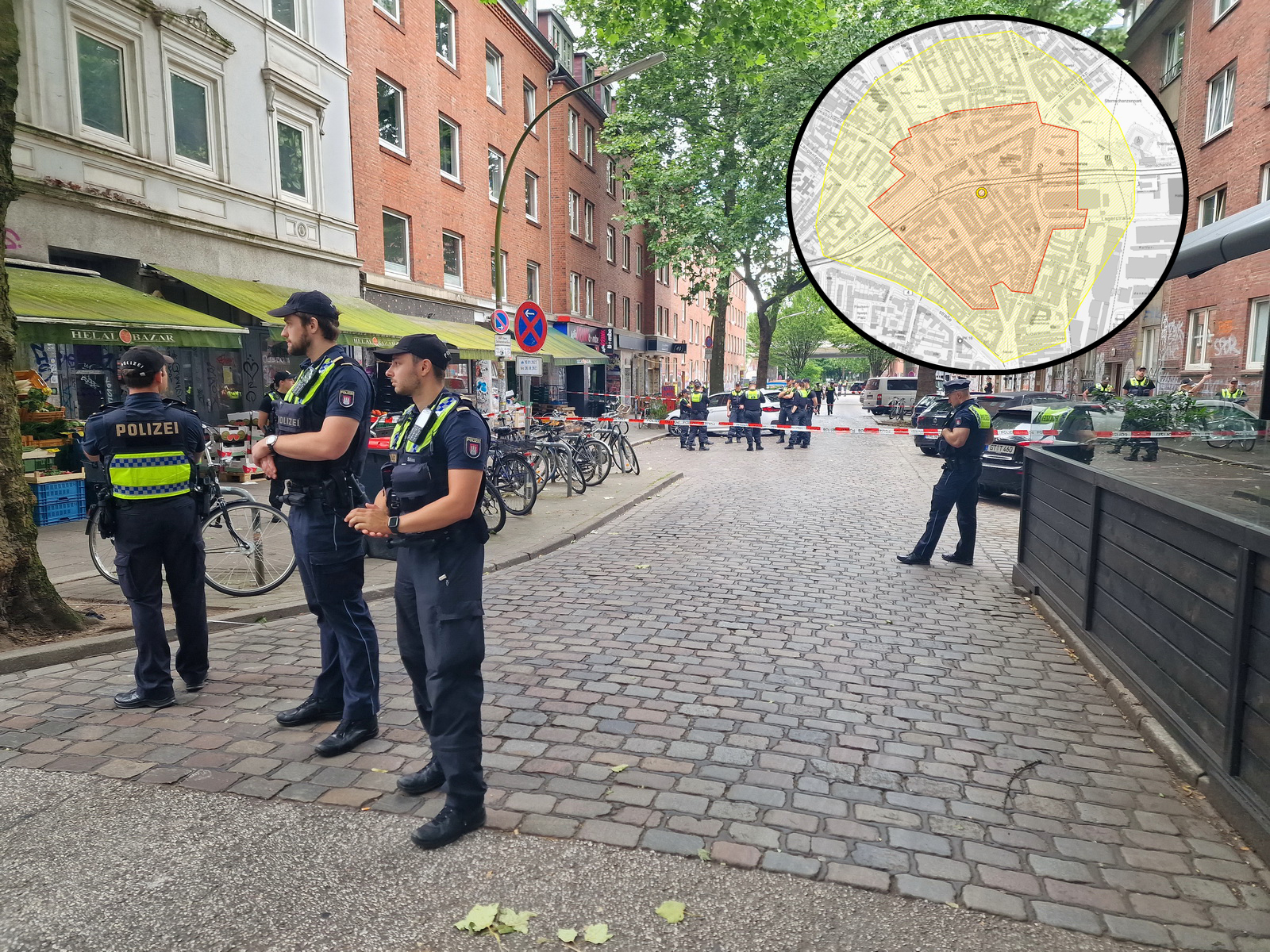 Polizisten haben den Fundort in der Sternschanze weiträumig abgesperrt. Der Sperrradius beträgt 300 Meter.