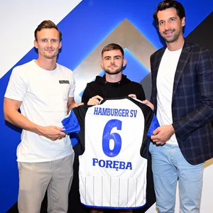Claus Costa und Jonas Boldt begrüßen Lukasz Poreba