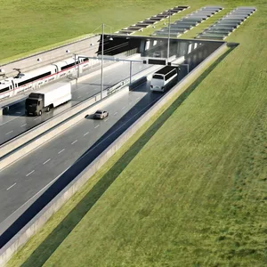 Visualisierung des Bereichs vorm geplanten Fehmarnbelt-Tunnel, vier Fahrspuren für Autos und Gleise für die Bahn