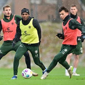 Lars Ritzka, Oladapo Afolayan und Max Marie im Training