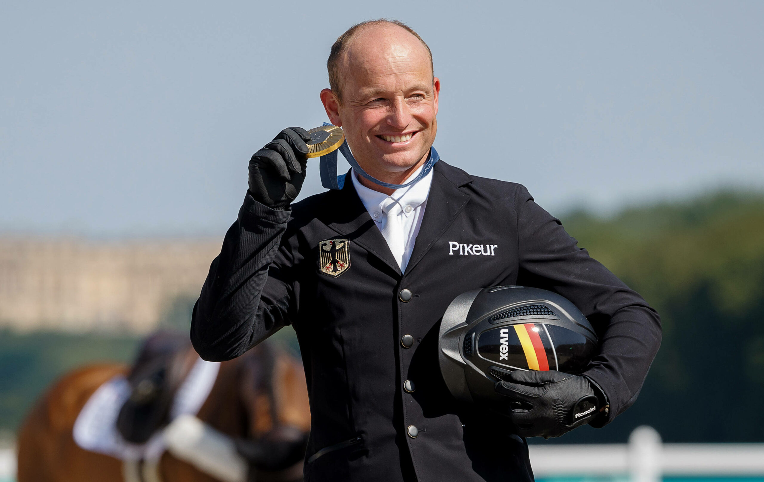 Michael Jung mit seiner Goldmedaille