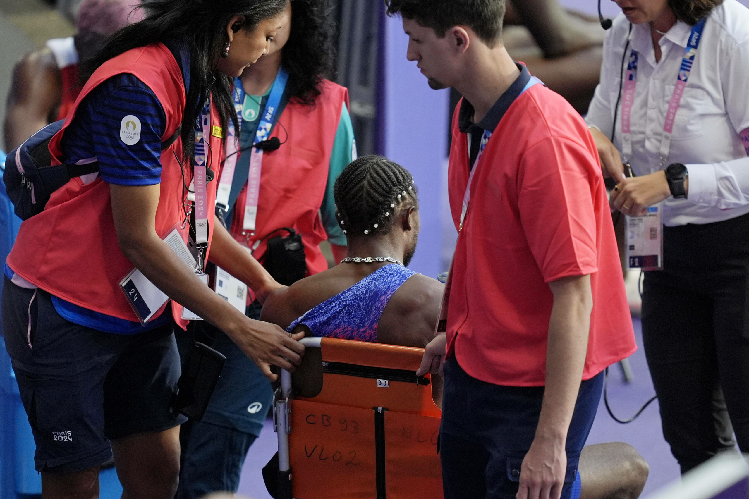 Noah Lyles im Rollstuhl