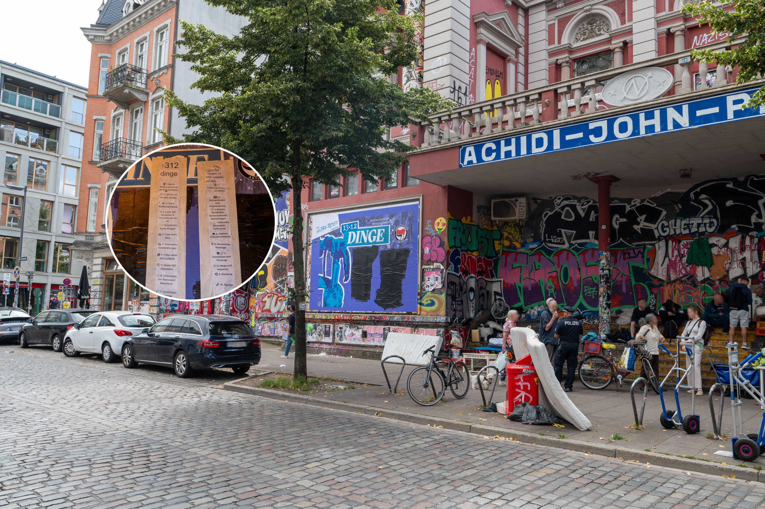 Das übermalte Plakat an der Fassade der Roten Flora. Über Nacht hängt nun eine neue Liste.