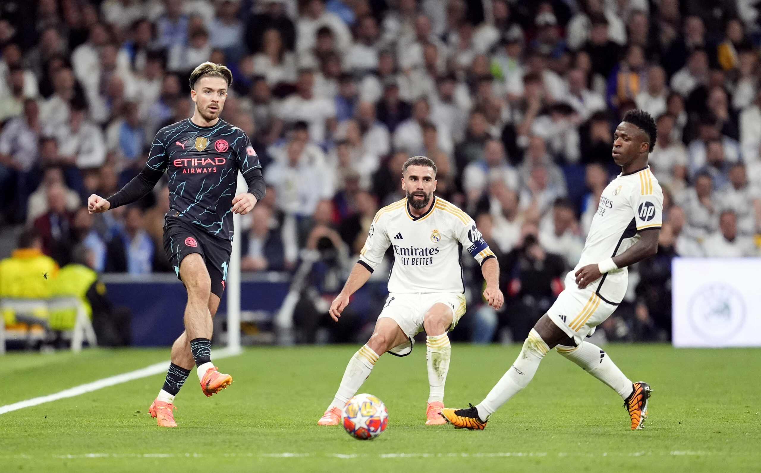 Dani Carvajal (M.) und Vinicius Jr. spielen gemeinsam für Real Madrid (hier gegen Manchester City).