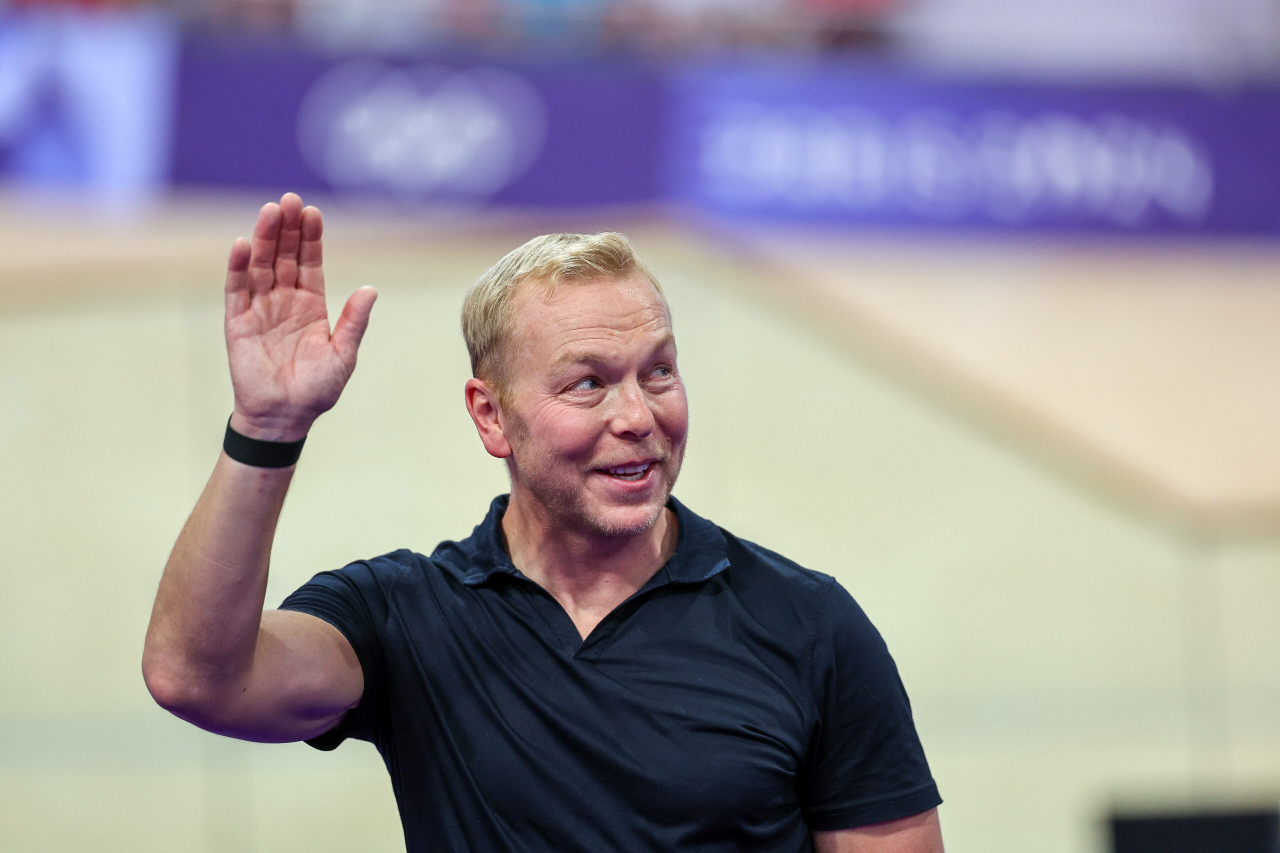 Sir Chris Hoy winkt mit der Hand