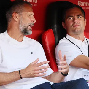 Marco Rose und Marcel Schäfer sitzen nebeneinander