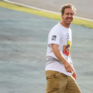 Sebastian Vettel lächelt