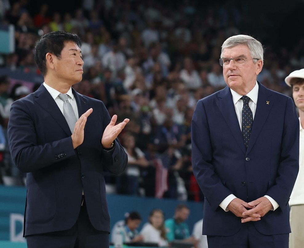 Molinari Watanabe (l.) und Thomas Bach (r.)