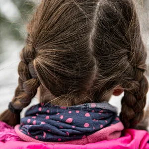 Ein Mädchen mit Zöpfen als Symvbolfoto für prügelnden Vater