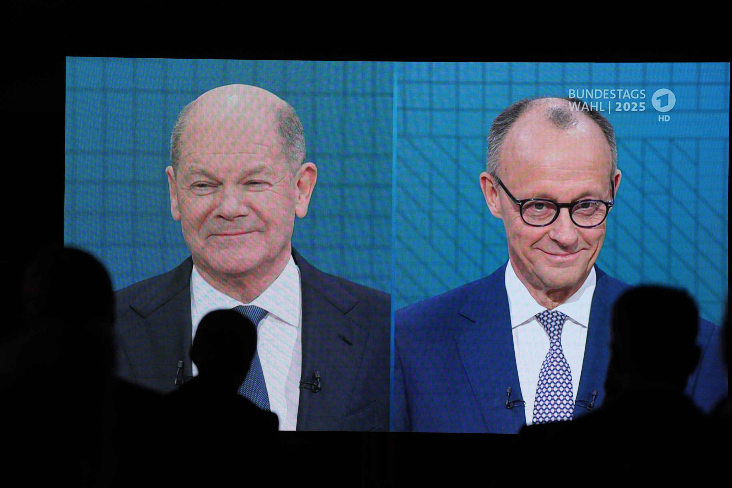 Olaf Scholz (l.) und Friedrich Merz