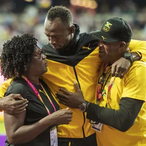 Usain Bolt mit seinen Eltern