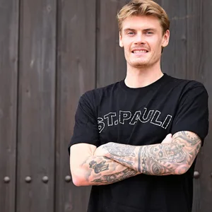 Eric Smith lächelt