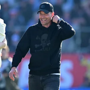 Alexander Blessin lächelt erleichtert
