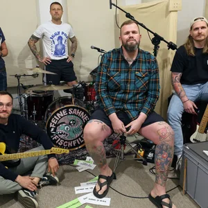 Max Bobzin (l-r), Hauke Segert, Olaf Ney, Jan "Monchi" Gorkow und Kai Irrgang von der Band "Feine Sahne Fischfilet" in ihrem Proberaum.