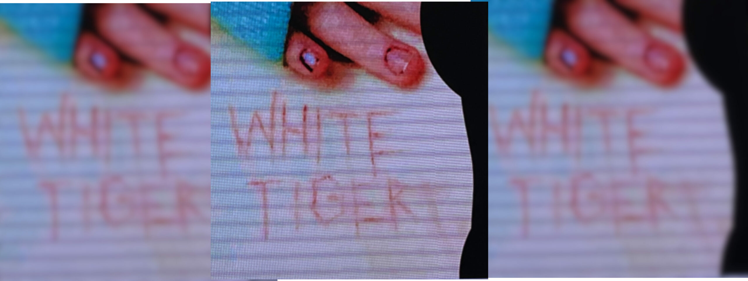 Der blutige Schriftzug „White Tiger“