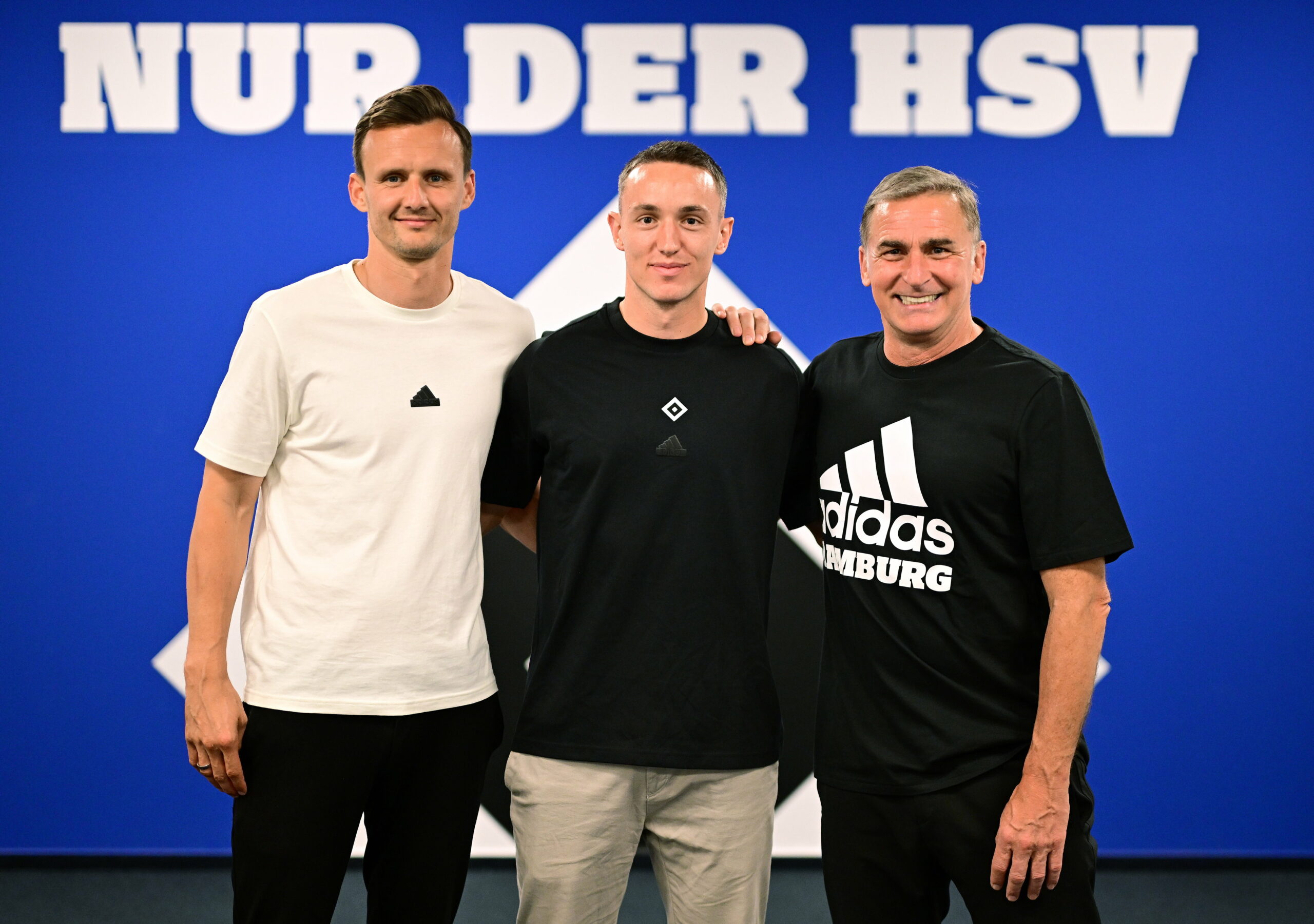 Claus Costa und Stefan Kuntz Arm in Arm mit Silvan Hefti