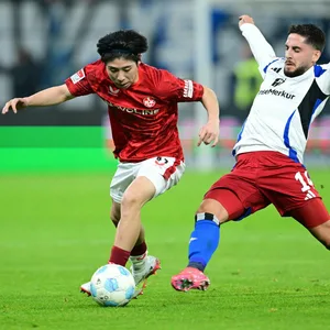 Daisuke Yokota im Duell mit Ludovit Reis