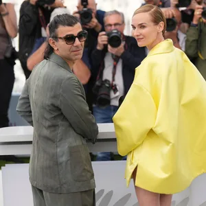 Regisseur Fatih Akin (l) und Diane Kruger posieren beim Fototermin für den Film „Amrum” auf den 78. Internationalen Filmfestspielen in Cannes.