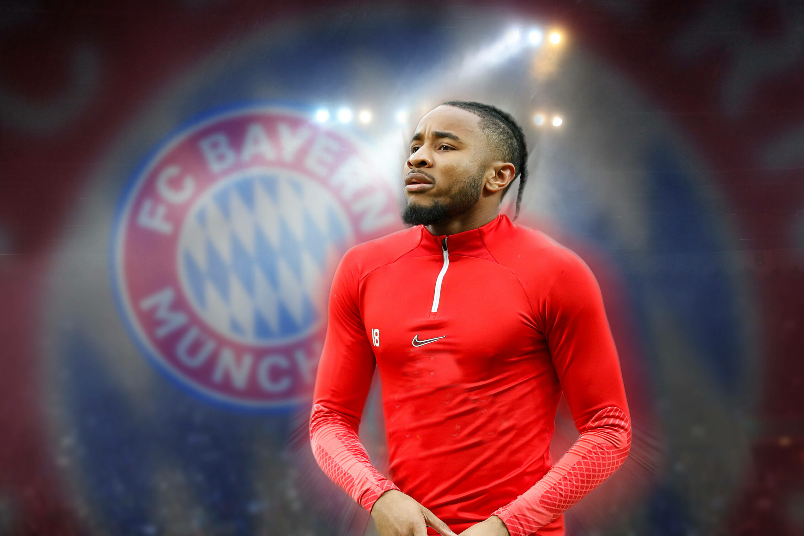 Christopher Nkunku vor dem Bayern-Wappen