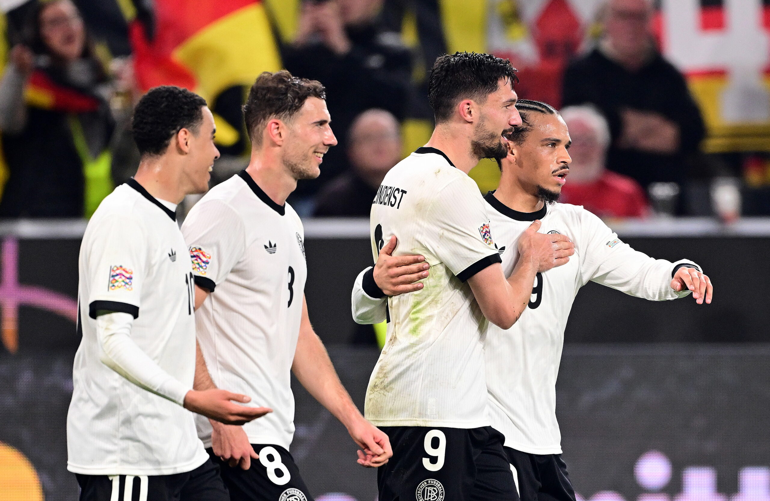 Tim Kleindienst mit seinen DFB-Kollegen Jamal Musiala, Leon Goretzka und Leroy Sane