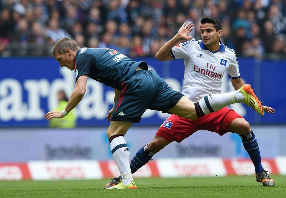 Tomás Rincon (r.) im Zweikampf mit Bastian Schweinsteiger.