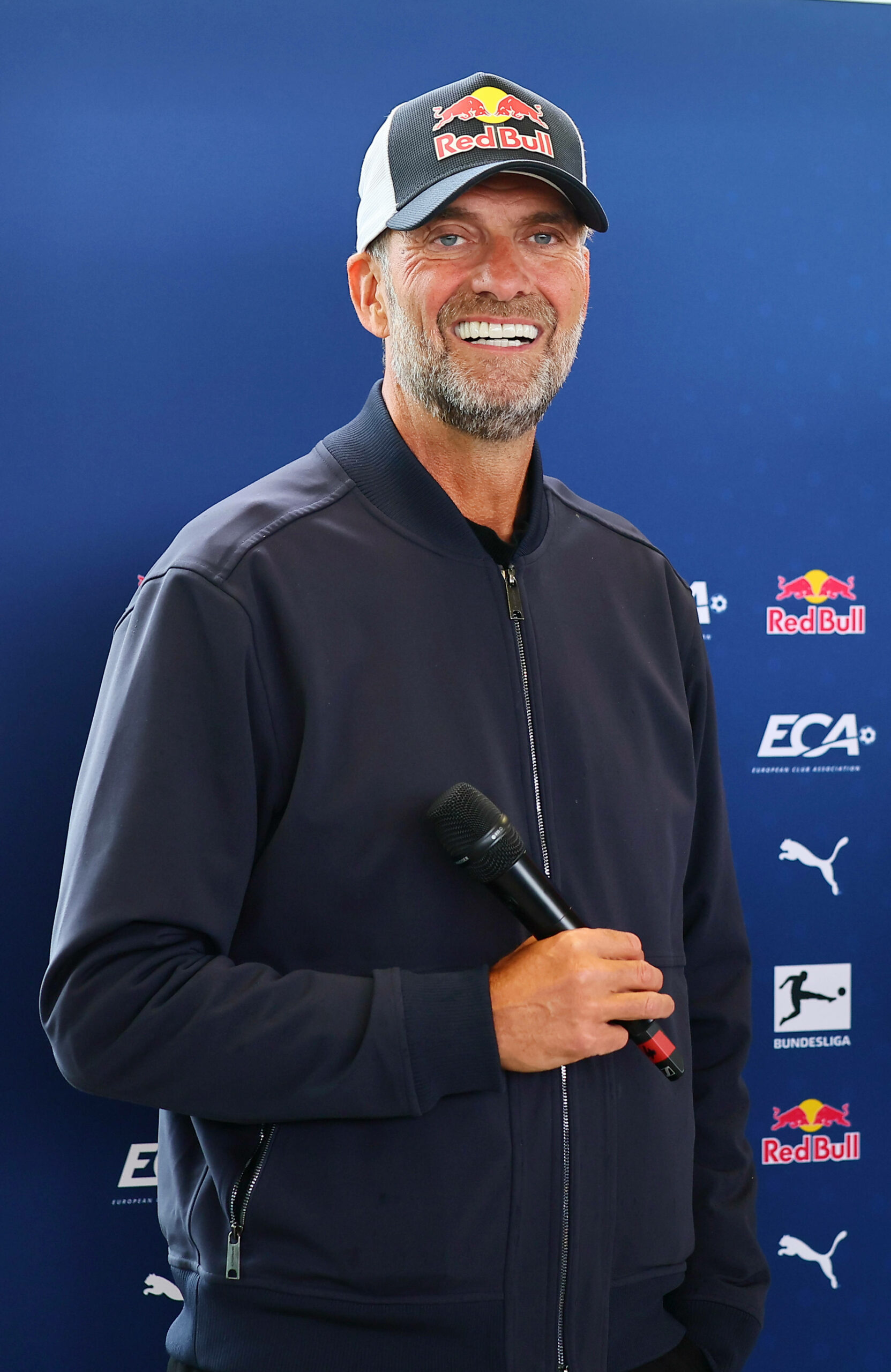 Jürgen Klopp mit einer Red-Bull-Kappe bei einem Event seines Arbeitgebers Red Bull