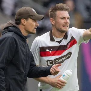 Hauke Wahl mit Trainer Alex Blessin