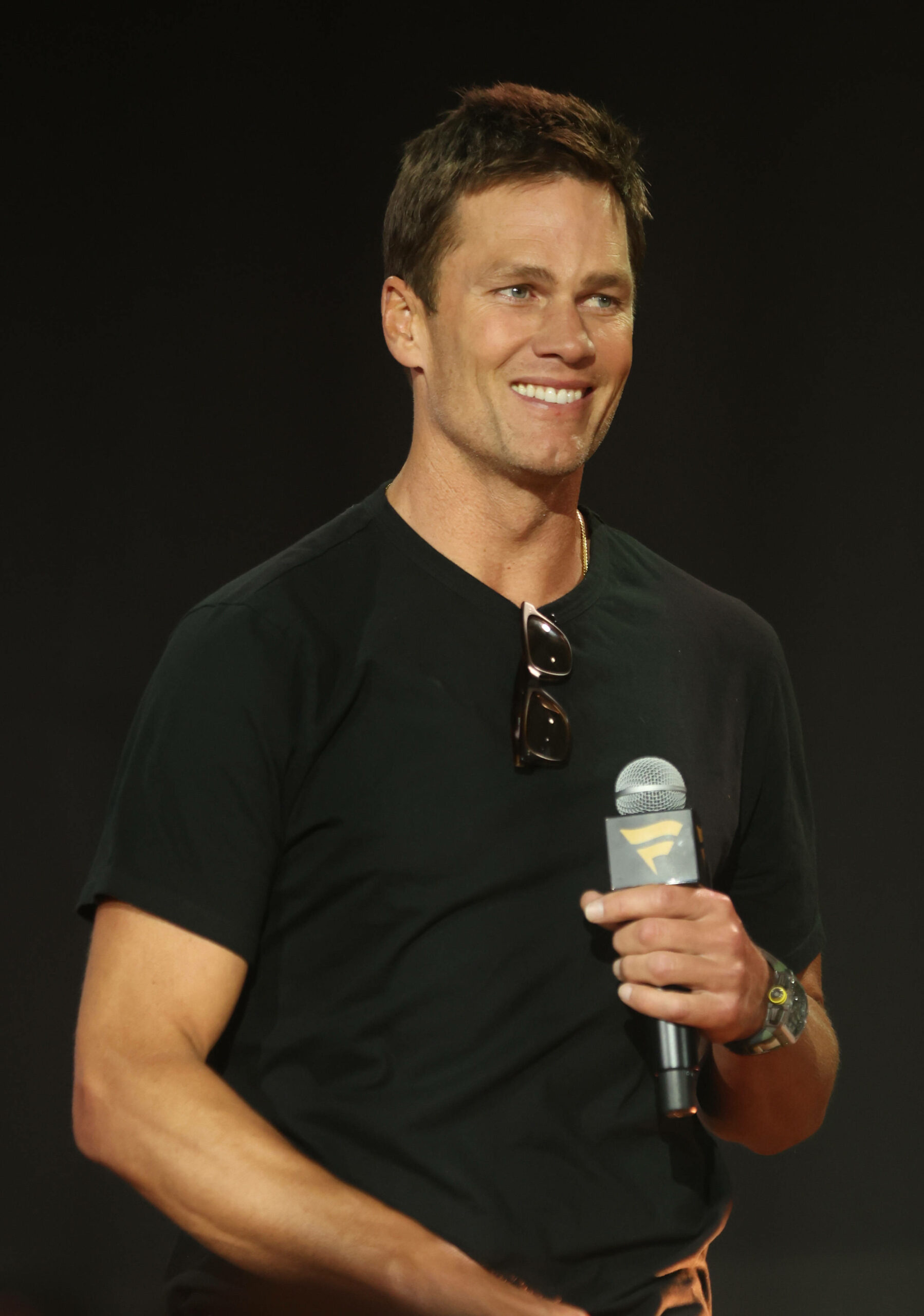 Tom Brady lächelnd bei einer Veranstaltung