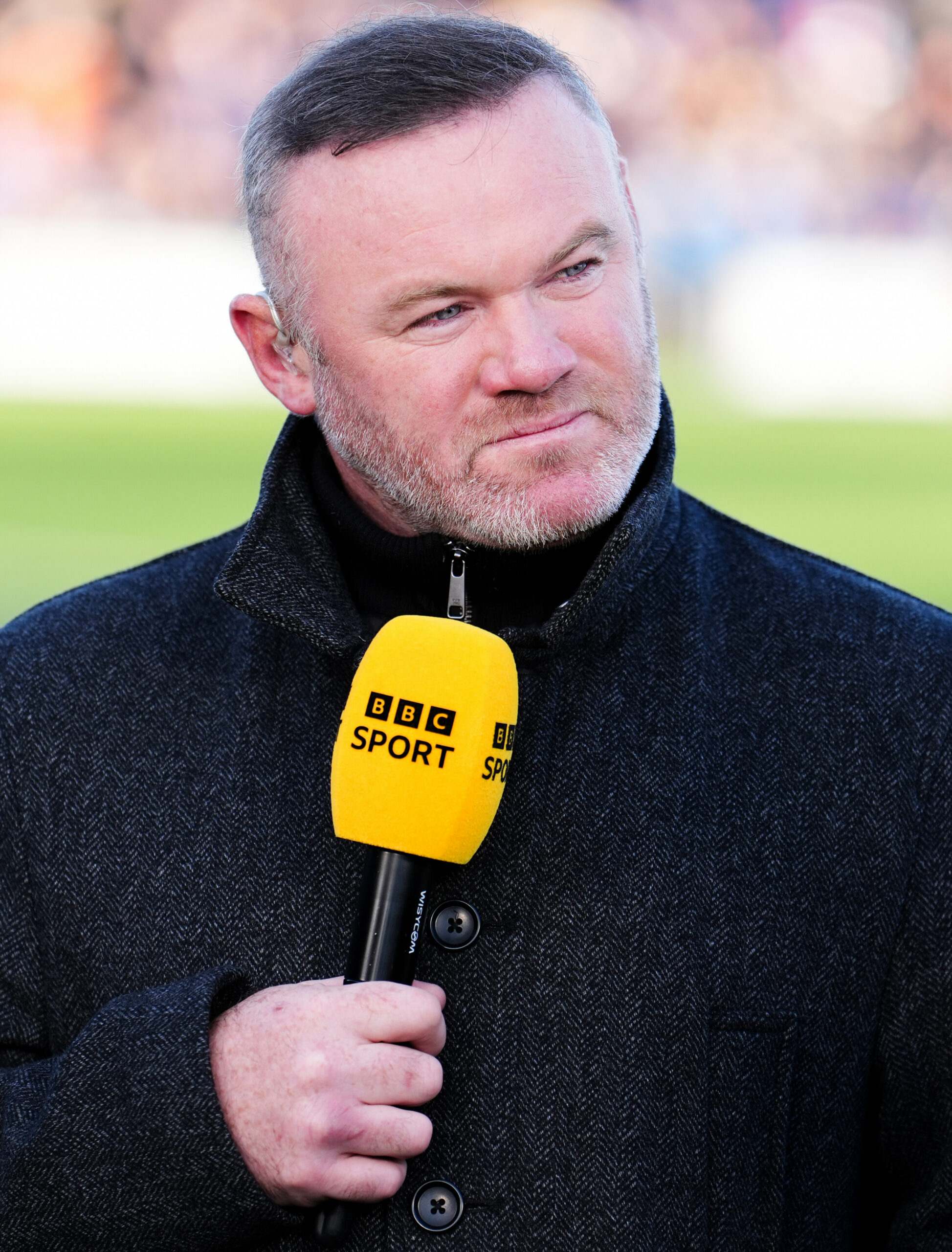 Wayne Rooney mit einem Mikrofon der BBC