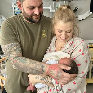 Die Glücklichen Eltern mit Baby Evelynn