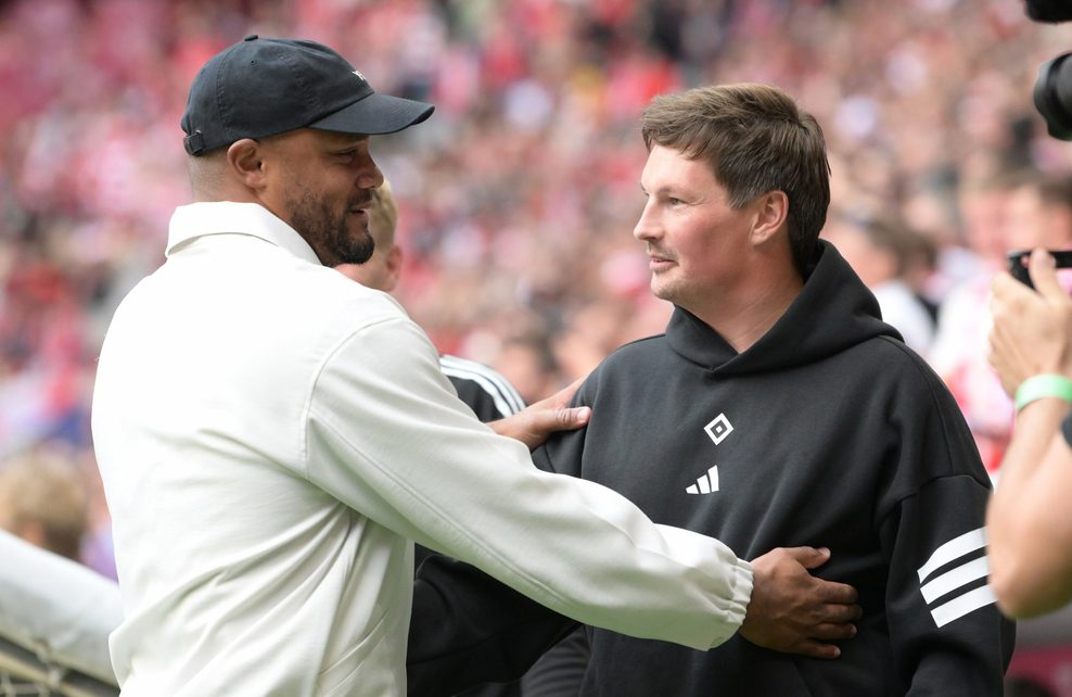 Vincent Kompany und Merlin Polzin umarmen sich