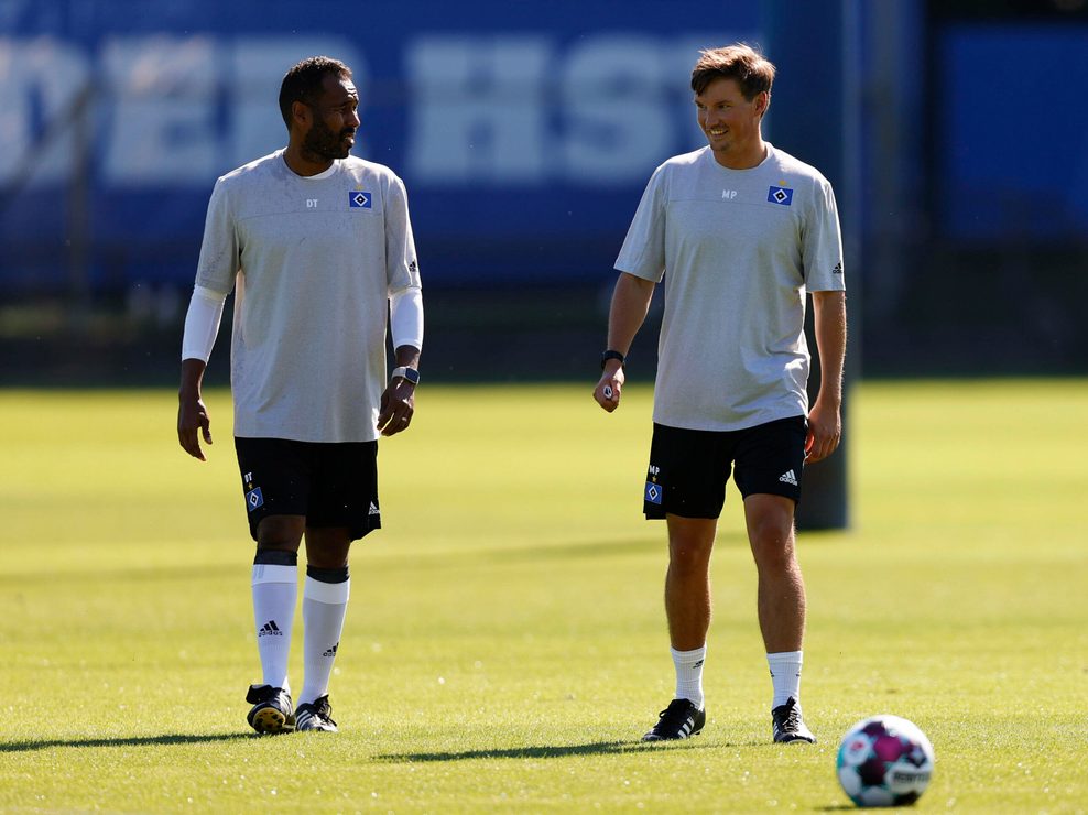 Daniel Thioune und Merlin Polzin auf dem Trainingsplatz