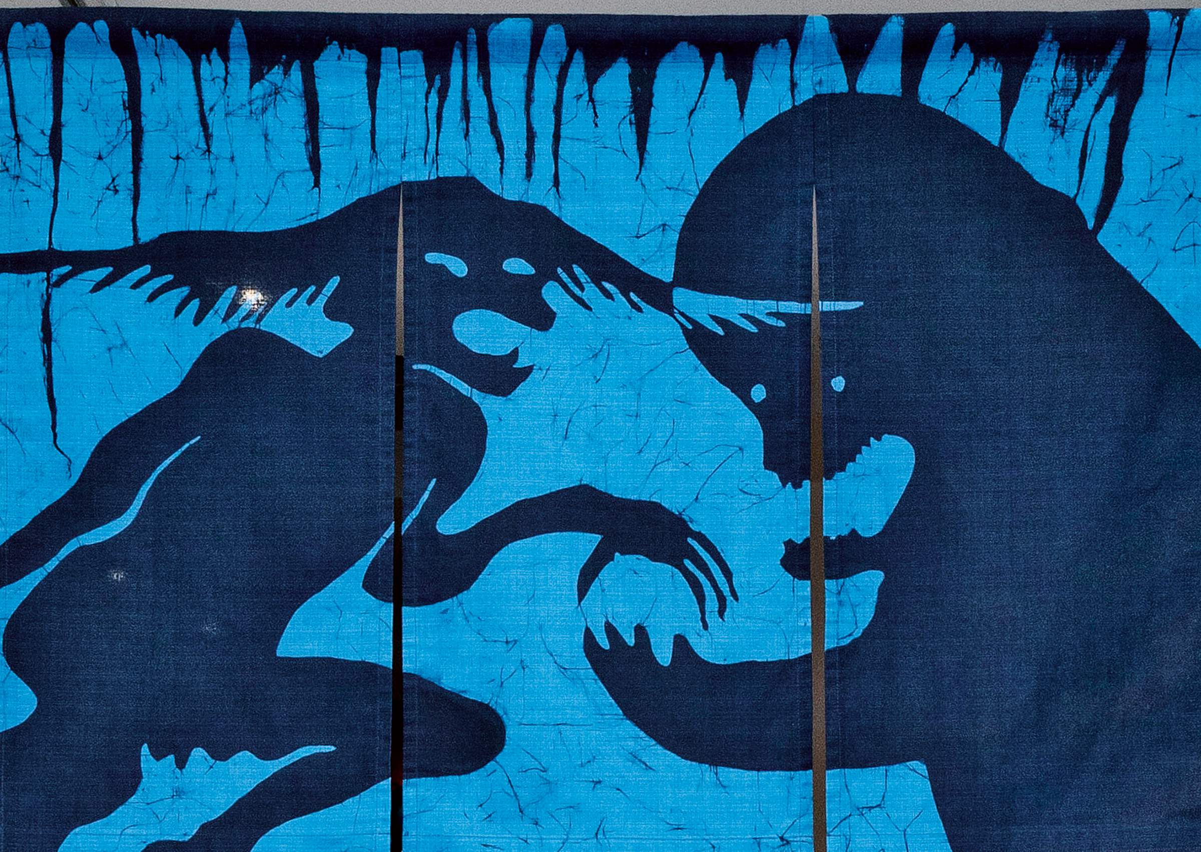 Ein Schattenbild abstrakter Kreaturen.