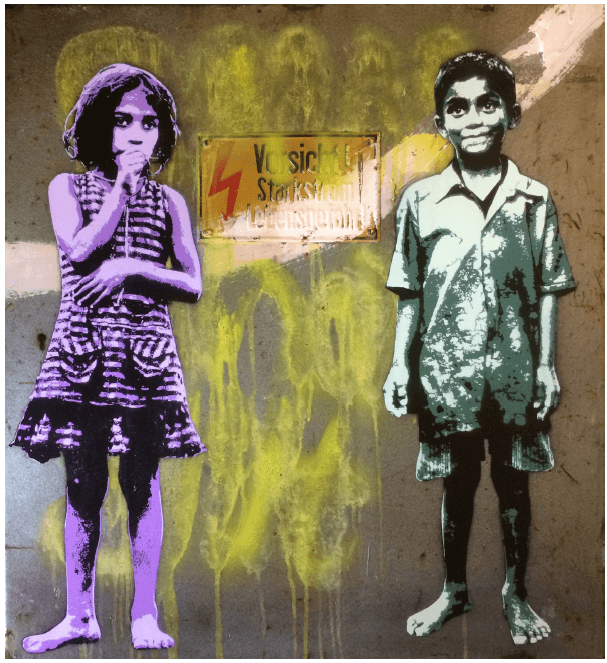 Ein Graffiti an einer Betonwand zeigt zwei Kinder.