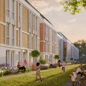 So sollen die künftigen Terrassenhäuser im Innenhof einmal aussehen. Die Rasenfläche ist heute noch unbebaut.